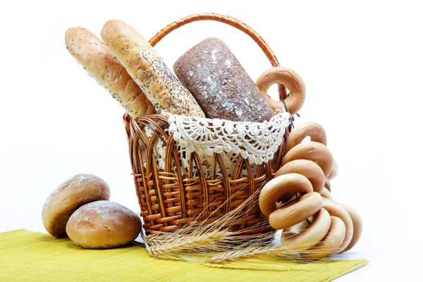 Fresh bread in the basket fully isolated. — Stock Photo, Image