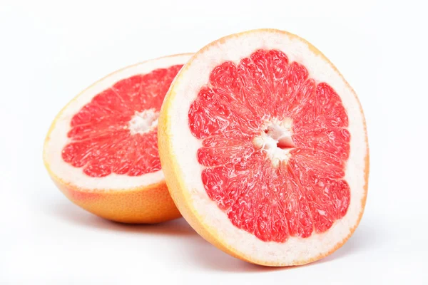 Čerstvé grapefruity na bílém pozadí. — Stock fotografie