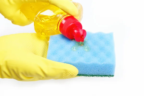 Hands in rubber gloves with a bottle of detergent and sponge on — Stock Photo, Image