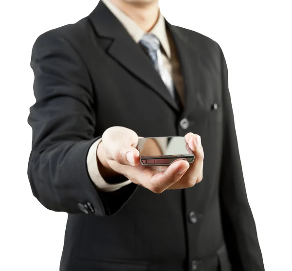 Biznesmen trzymający telefon komórkowy — Zdjęcie stockowe