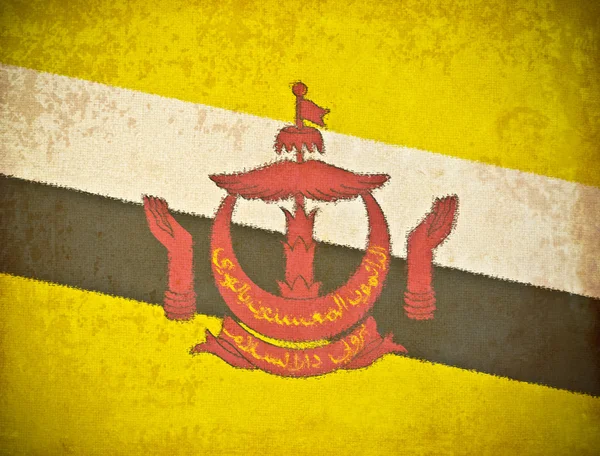 Старая гранж-бумага на фоне флага Брунея — стоковое фото