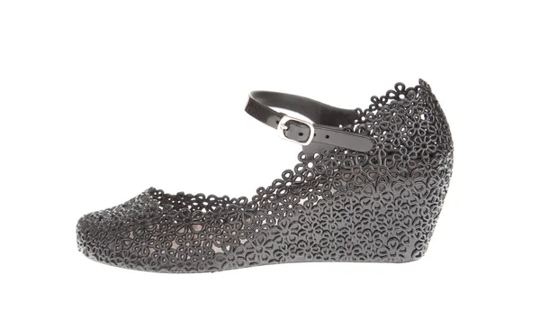 Par de zapatos de plataforma de goma negro sobre fondo blanco — Foto de Stock