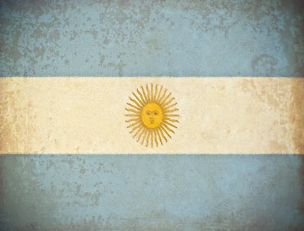 Oud grunge papier met Argentinië vlag achtergrond — Stockfoto