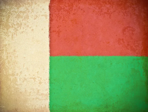 Vecchia carta grunge con sfondo bandiera Madagascar — Foto Stock