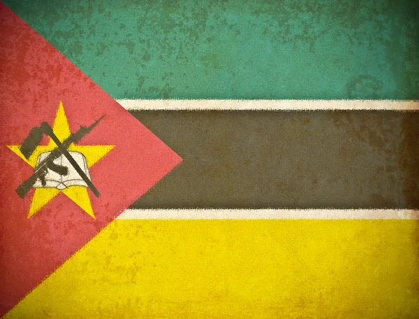 Viejo papel grunge con fondo de bandera de Mozambique —  Fotos de Stock