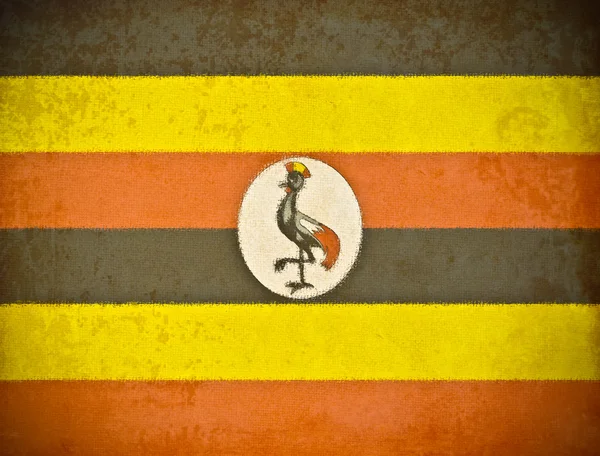 Vecchia carta grunge con sfondo bandiera Uganda — Foto Stock