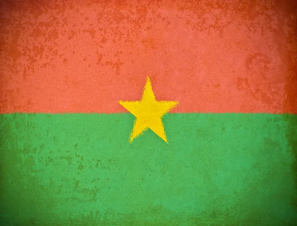 Viejo papel grunge con fondo de la bandera de Burkina Faso — Foto de Stock
