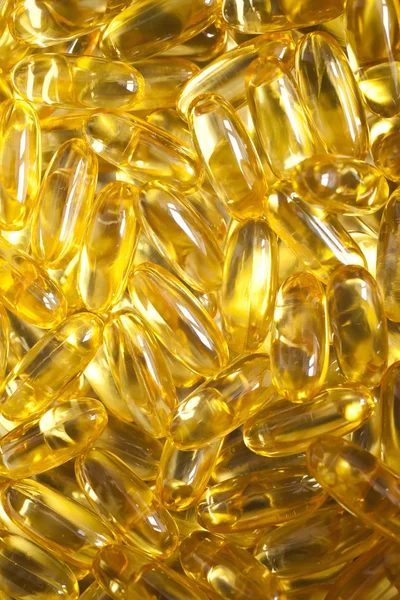 Yellow medicines background — Stock Photo, Image