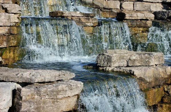 Closeup of beautiful waterfall in the park — Stock Photo, Image