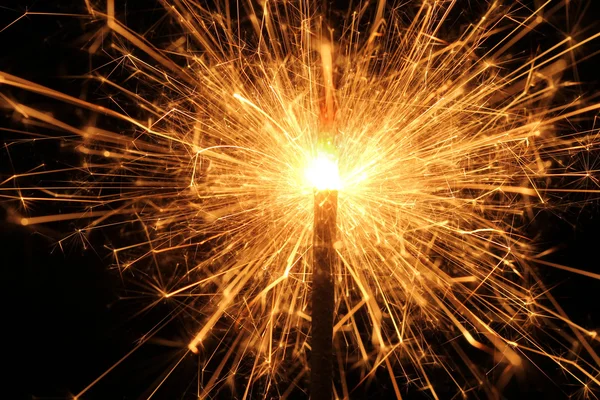 Burning Christmas sparkler isolated on black background. Bengal fire. — Stock Photo, Image