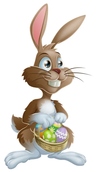 Wielkanoc królik trzymając Wielkanoc jaja kosz — Wektor stockowy
