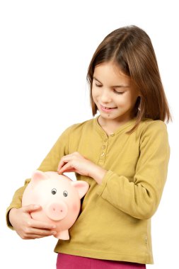 Little girl with piggy bank clipart