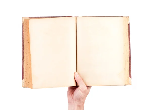 Mão segurando livro antigo em branco — Fotografia de Stock
