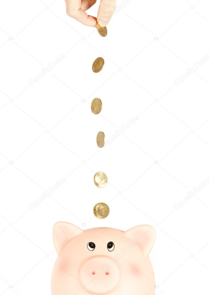 Putting money on a piggy bank