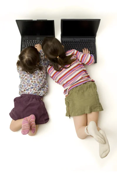 Two little girls with laptop — Stock Photo, Image