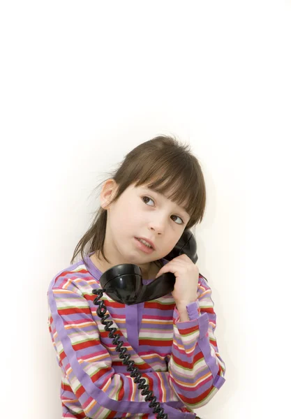Bambina con telefono antico — Foto Stock