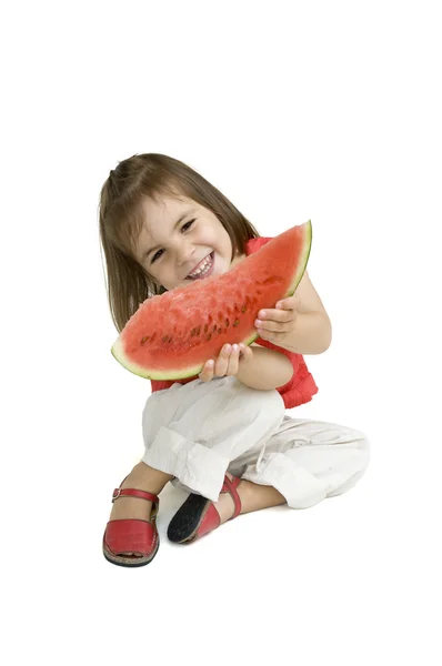 吃西瓜的小女孩 — 图库照片