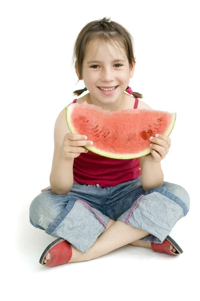 Kislány eszik görögdinnyét — Stock Fotó