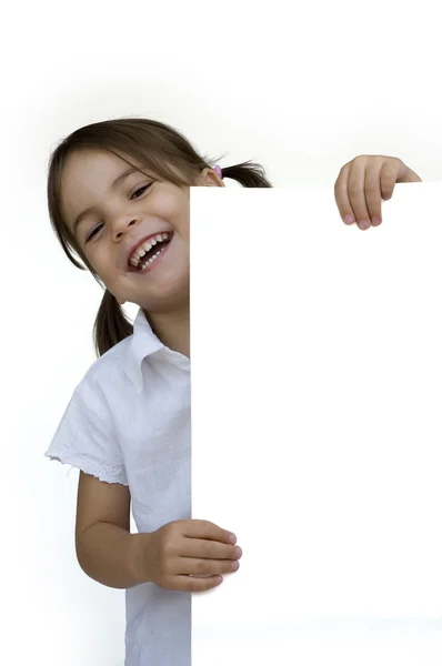 Liten flicka som håller en vit banderoll — Stockfoto