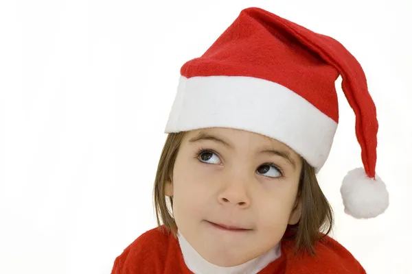 Petite fille avec chapeau de Père Noël Images De Stock Libres De Droits