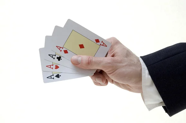 Businessman holding four aces — Stock Photo, Image