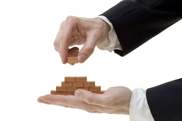 Businessman building a wall — Stock Photo, Image