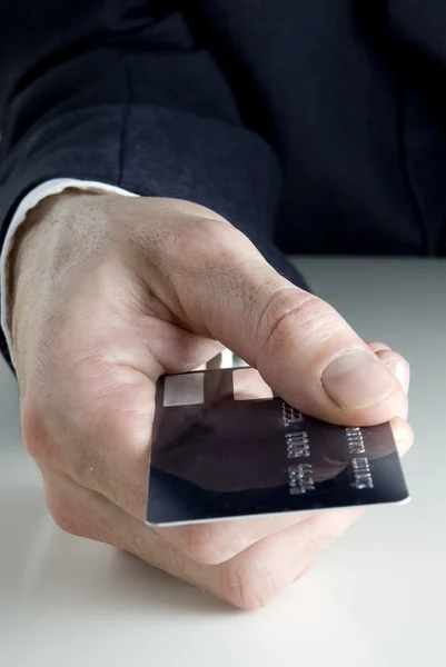 Stock image Holding a credit card