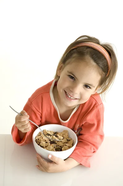 Little girl with breakfast — Stock Photo, Image