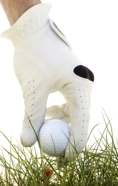 Hand legt den Golfball in den Abschlag — Stockfoto