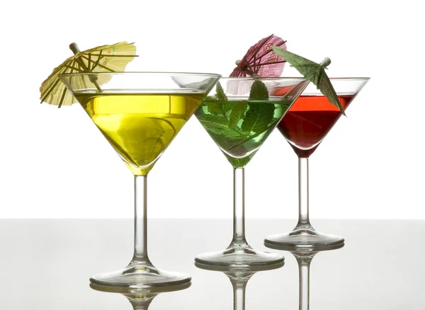 Три коктейлі з парасолькою — стокове фото