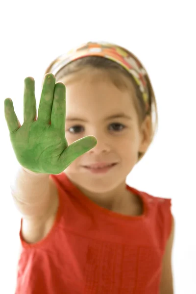 Liten flicka med hennes händer målade — Stockfoto