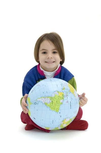 Young girl embracing the world globe — Stock Photo, Image