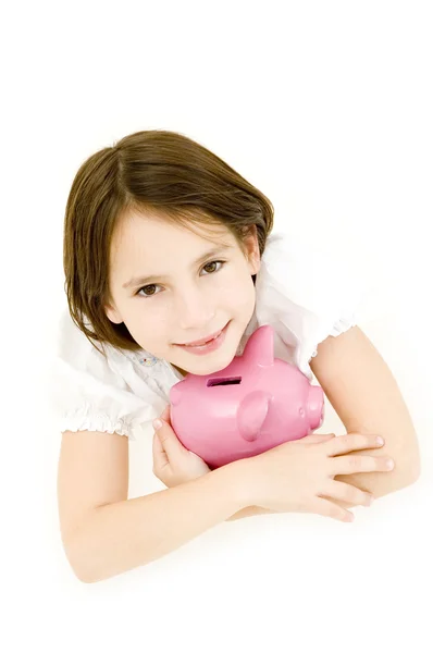 Menina jovem com banco porquinho — Fotografia de Stock