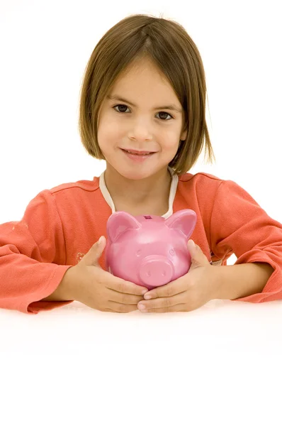 Menina com banco porquinho — Fotografia de Stock