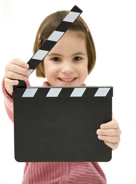 Little girl with a clapperboard — Stock Photo, Image