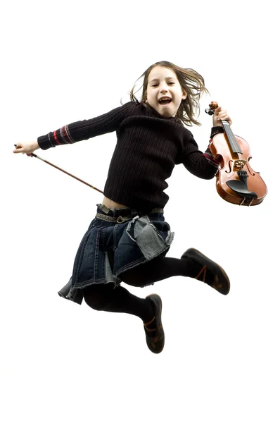 Young girl with violin jumping — Stock Photo, Image