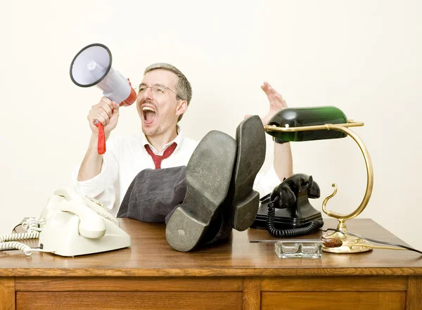 Hombre de negocios con megáfono — Foto de Stock