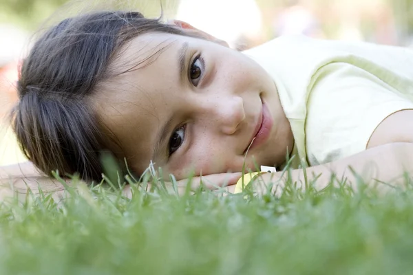 Laying on the grass — Stock Photo, Image