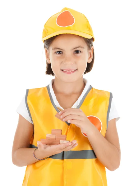 Little girl building a wall — Stock Photo, Image