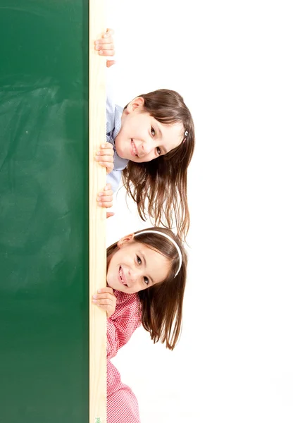 黒板と二人の女の子 — ストック写真