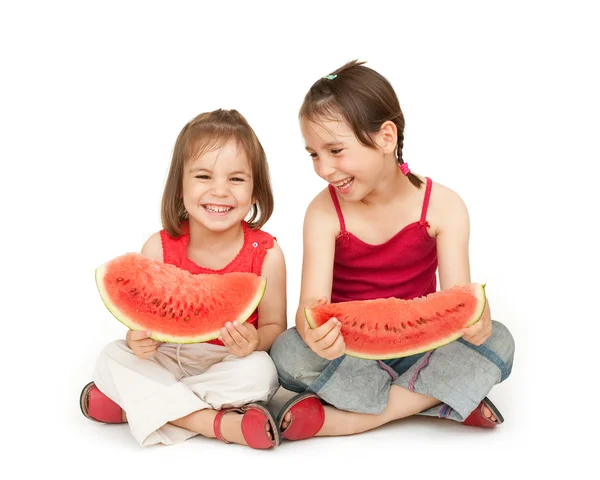 Kis lányok eszik görögdinnye — Stock Fotó