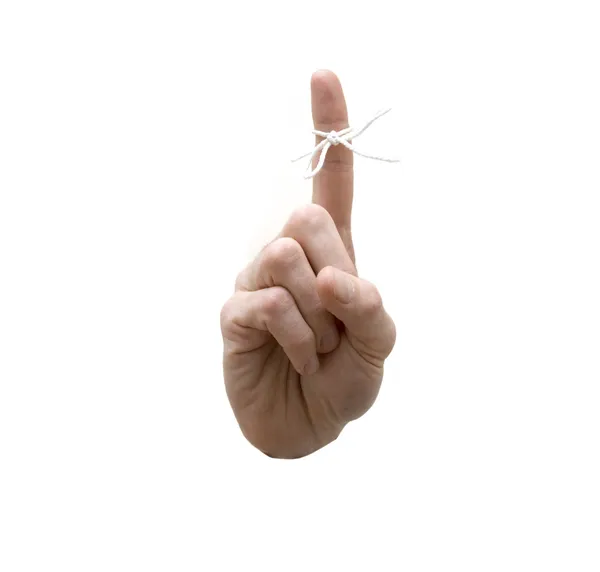Cuerda blanca atada alrededor de un dedo — Foto de Stock