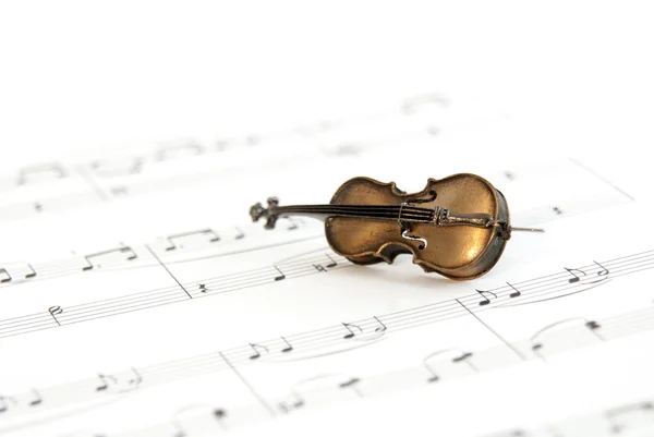 stock image Small classical instrument on note paper