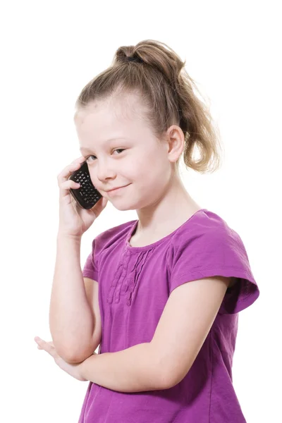 Junges Mädchen mit einem Mobiltelefon — Stockfoto