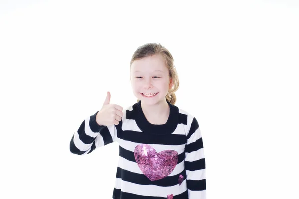 Jeune fille donnant un pouce signe — Photo