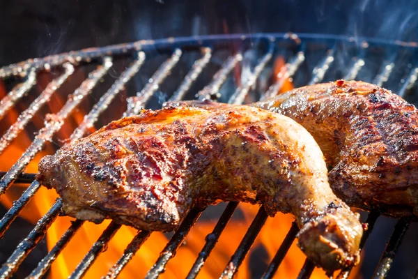 Close-up of chicken leg on the grill — Stock Photo, Image
