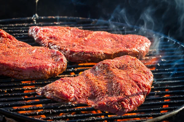 Grilled steak with fire toasted — Stock Photo, Image