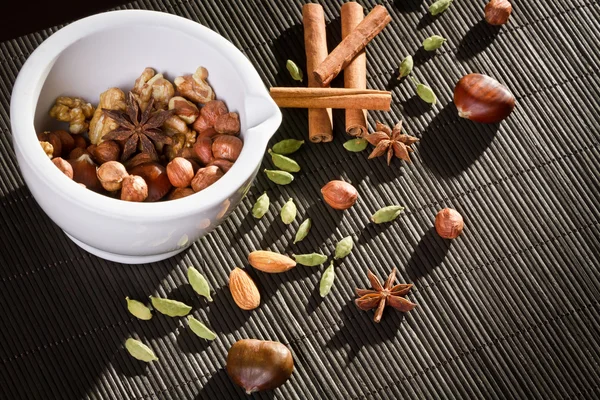 stock image Different kinds of nuts in white mortar