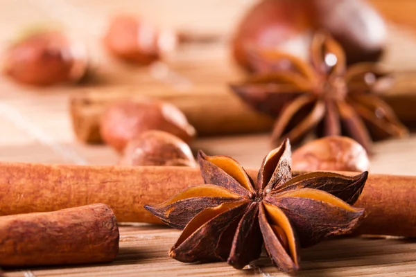 Closeup star anise and different kinds of nuts — Stock Photo, Image
