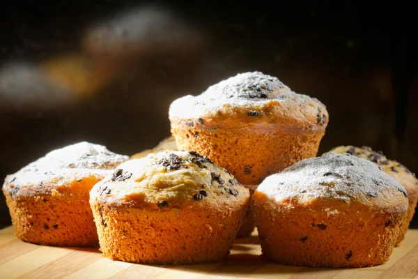 Alcuni muffin cremosi con zucchero di ricino — Foto Stock